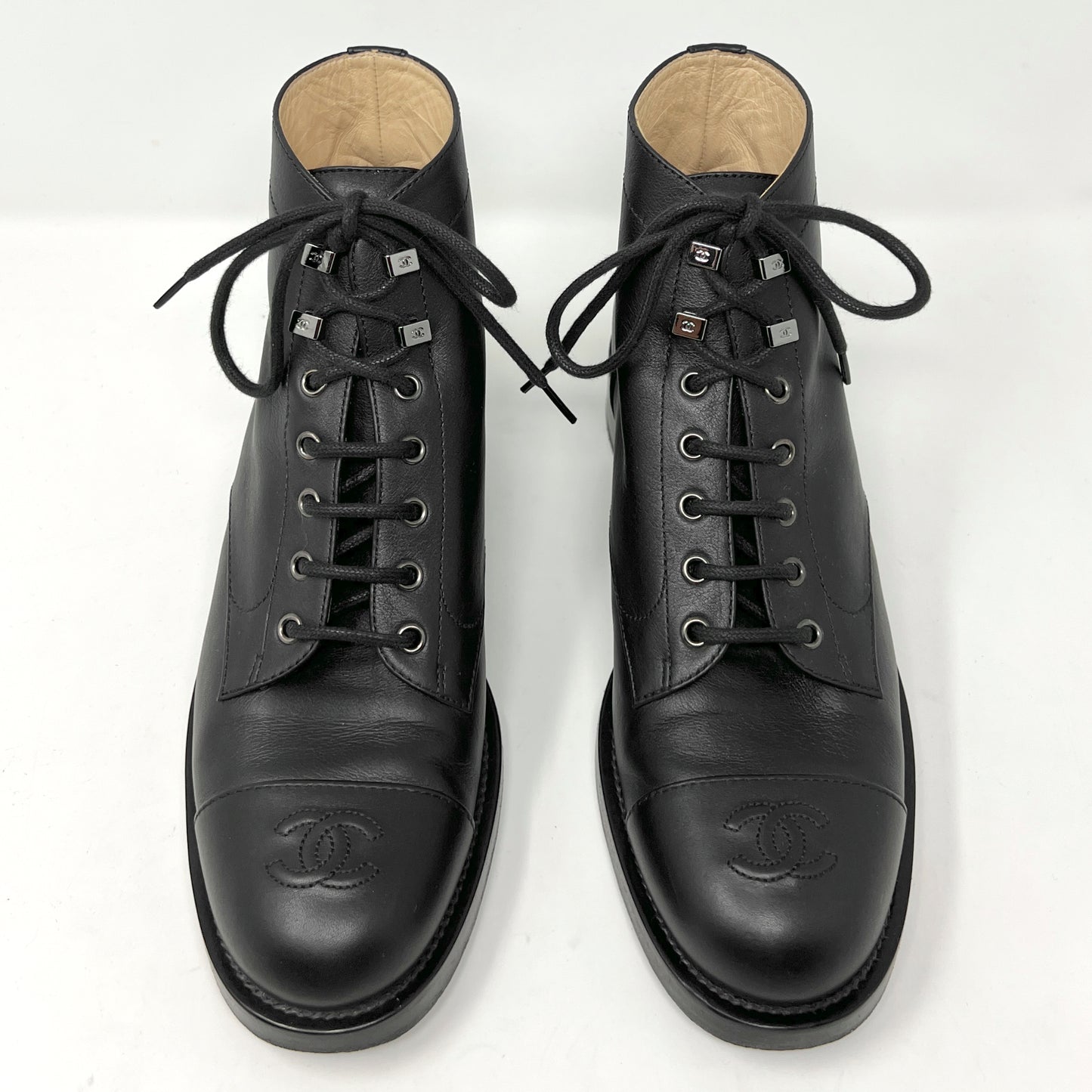 Chanel 2020 Black Leather Logo Cap Toe Lace up Combat Ankle Boots front view