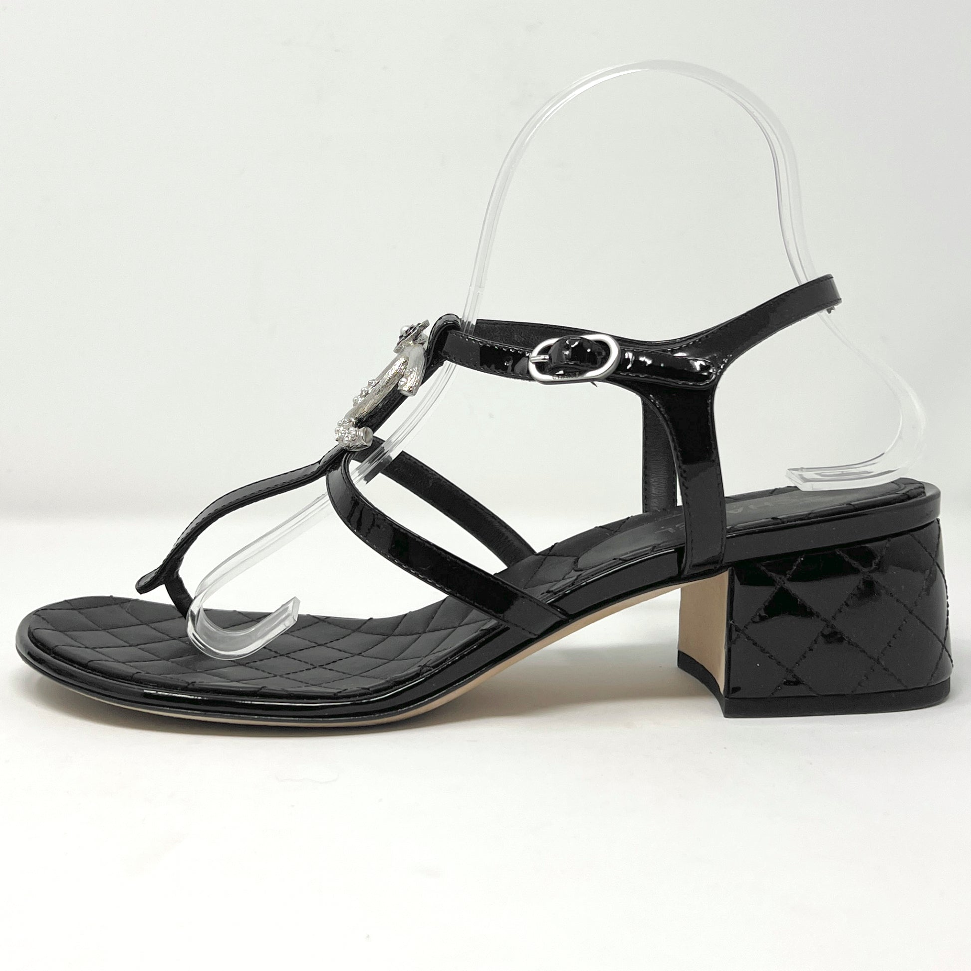 Chanel Black Quilted Matelasse Patent Leather Silver Metal Interlocking Logo Camellia Detail Block Low Heel Sandals